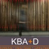 K B A