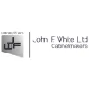 John F White
